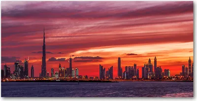 Produktbild von Tulup® Glas-Bild - 100x50 -Wandkunst - Wandbild hinter gehärtetem Sicherheitsglas  - Sehenswürdigkeiten & Architektur - Sonne Dubai - Orange
