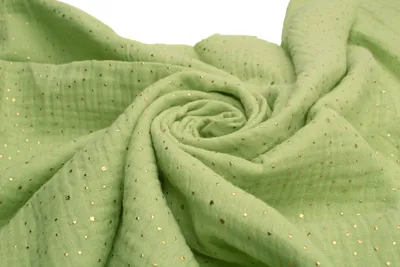 Image de Tissu en mousseline de coton à pois dorés, double gaze, pistache 50 x 130 cm
