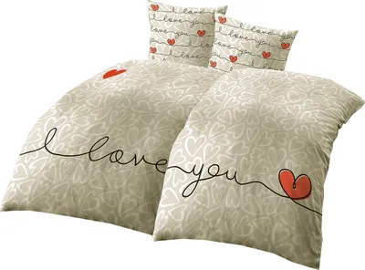 A bedding set with a heart pattern and the text 'I love you'.