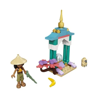 A LEGO set featuring a character, a small building, and accessories on a white background.