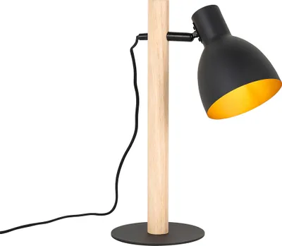 A black desk lamp with a wooden stand and a gold interior on a white background.