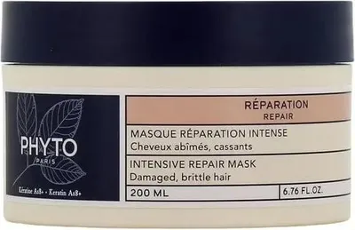A product shot of a hair mask in a jar.