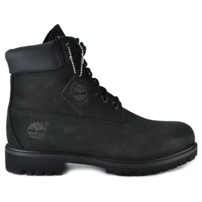A black Timberland boot is shown against a white background.