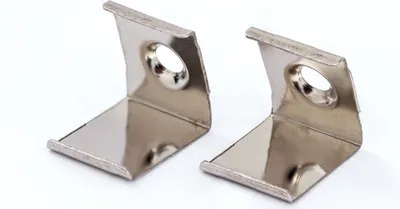 Zdjęcie produktu dla Klipsy do narożnych profili aluminiowych 1050 2 sztuki Mocowanie do taśm LED do B12mm, kątowe, białe