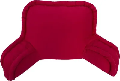 A red backrest pillow with armrests, isolated on a white background.