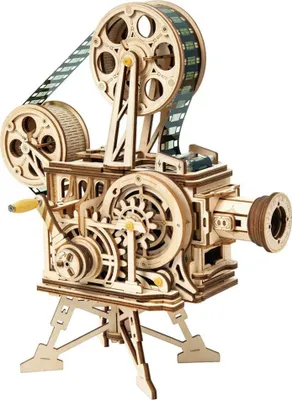 A wooden model of a vintage film projector.