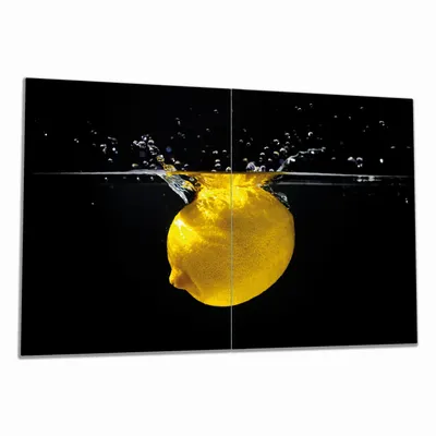 Produktbild von Wallario Herdabdeckplatte aus Glas, Größe 80 x 52 cm 2-teilig, Motiv Zitrone im Wasser - Frisches Obst für die Küche