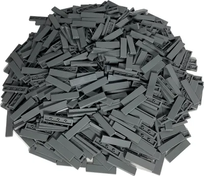 A pile of dark gray LEGO® 1x4 tiles.