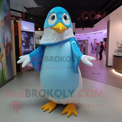 Produktbild von Himmelblauer REDBROKOLY Pinguin Maskottchen kostüm gekleidet mit einem Kleid und Broschen