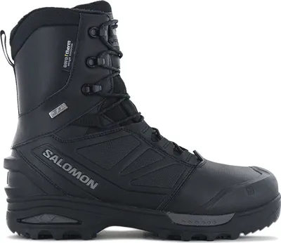 A black Salomon hiking boot shown from the side.