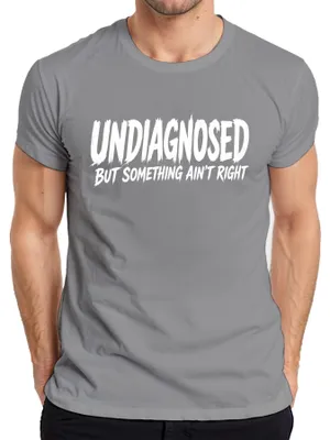 Immagine prodotto di T-shirt "Undiagnosed But Something Ain't Right" di Lustig, con scritta sarcastica, colore grigio, taglia 3XL