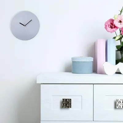 Immagine prodotto di Orologio da parete minimalista grigio - Senza numeri, alimentato a batteria
