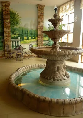 Produktbild von Casa Padrino Barock Garten Deko Springbrunnen Beige 181 x 181 x H. 180 cm - Prunkvoller Gartenbrunnen im Barockstil - Stein Brunnen mit Umrandung - Barock Garten & Terrassen Deko Accessoires