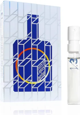 A product shot of a perfume sample vial and its packaging.