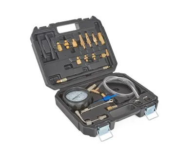 A black plastic case containing a compression tester kit for gasoline engines.