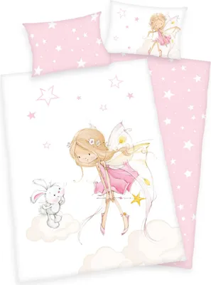 A flat lay of a children's duvet cover and pillowcase set with a fairy and bunny illustration.