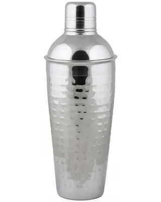 A silver cocktail shaker with a hammered texture, shown against a white background.