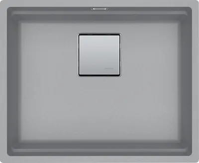 A top-down view of a gray sink with a silver drain cover.