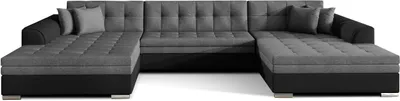 A U-shaped sofa with a tufted seat and black base.