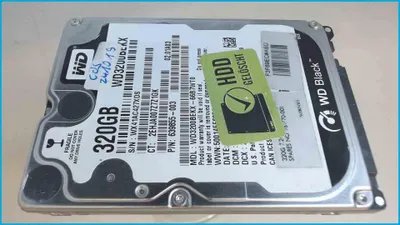 A hard disk drive is shown from a diagonal angle on a light gray background.