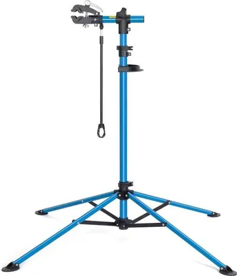 Produktbild von Professionelle Fahrradmontagestand mit Werkzeugtisch - drehbar und einklappbar - bis 30 kg belastbar