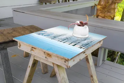 Produktbild von Wallario selbstklebende Möbelfolie/ Tischdecke für Innen und Außen, Größe: 90 x 90 cm - Verschneite Bäume in einer Winterlandschaft