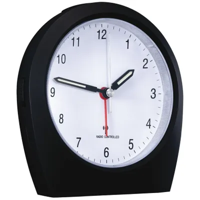 A black alarm clock with a white face is shown against a white background.