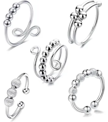 Immagine prodotto di 5 anelli antistress regolabili con perline, colorati, aperti, adatti come anelli "fidget" per donne