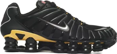 A studio shot of a single Nike Shox TL sneaker.