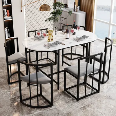 A dining table set with six chairs in a well-lit dining room with a large window overlooking water.