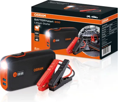 A product shot of a car battery jump starter and its packaging.