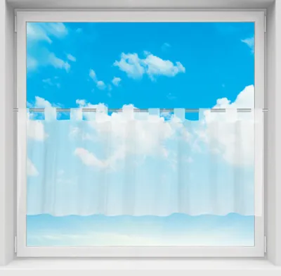 A white bistrogardine with loops hangs in front of a window showing a blue sky with clouds.