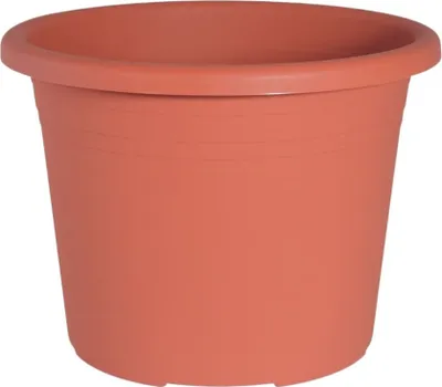 A terracotta colored planter pot on a white background.