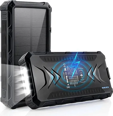 A black solar power bank with a solar panel on one side and a charging surface with a light on the other.