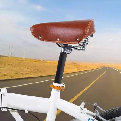 Produktbild von Bequames braunes Fahrradsattel mit Nieten