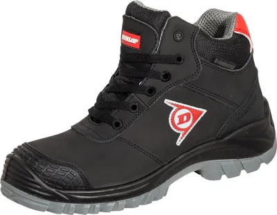 A single black Dunlop work boot is shown against a white background.