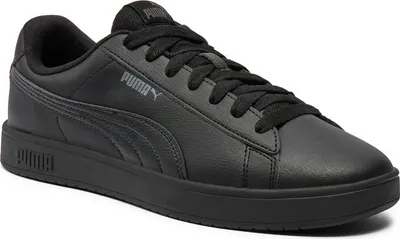A black Puma sneaker is shown from a side angle against a white background.