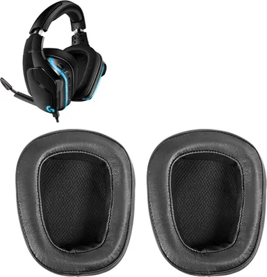 A pair of black ear pads and a black gaming headset with blue accents.