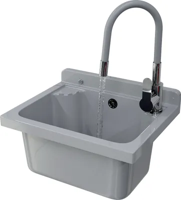 A gray sink with a flexible faucet with water running.