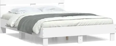 A white bed frame with a mattress and bedding, shown from a side angle against a white background.