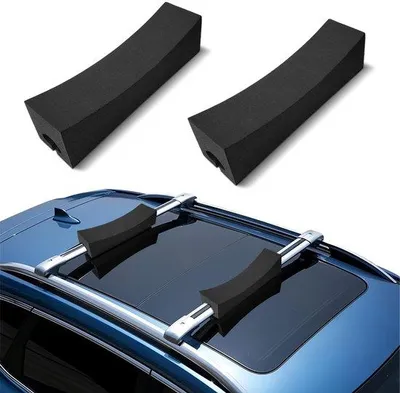Imagen del producto de Soportes universales para techo Unyqoos® con capacidad de 80 kg y protección de EVA, ideales para tablas de surf, SUP, kayaks y tablas de paddle surf. Diseño aerodinámico y montaje sin necesidad de herramientas