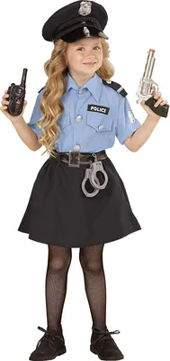 A young girl dressed as a police officer, holding a toy walkie-talkie and a toy gun.