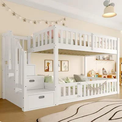 A white wooden bunk bed with stairs and drawers in a child's room.