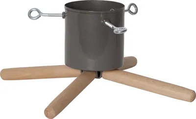 A Christmas tree stand with a metal bucket and wooden legs, isolated on a white background.