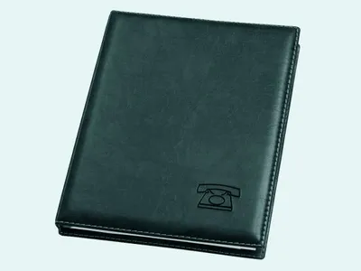 A black leather-bound address book with a telephone icon embossed on the cover.