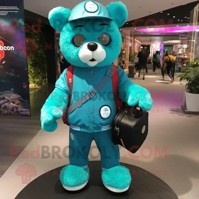 Produktbild von Türkiser REDBROKOLY Bär Maskottchen Kostüm charakter bekleidet mit einer Jacke und Rucksäcken