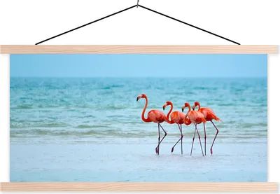 Produktbild von MuchoWow® Textilposter Vier Flamingos stehen am Strand 120x60 cm mit holzfarbenen Rahmen - Klemmleiste