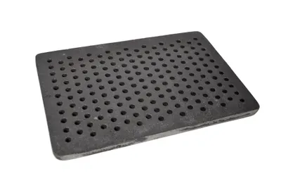 A rectangular grate with many small holes, likely for a stove or oven, is shown against a white background.
