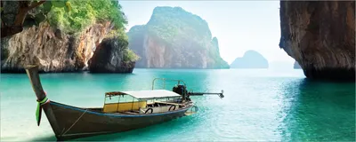 Produktbild von Wallario selbstklebendes Poster - Fischerboot in Thailand  blaues Meer und Steinfelsen, Größe: 80 x 200 cm