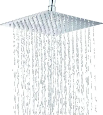A square shower head with water spraying from it.